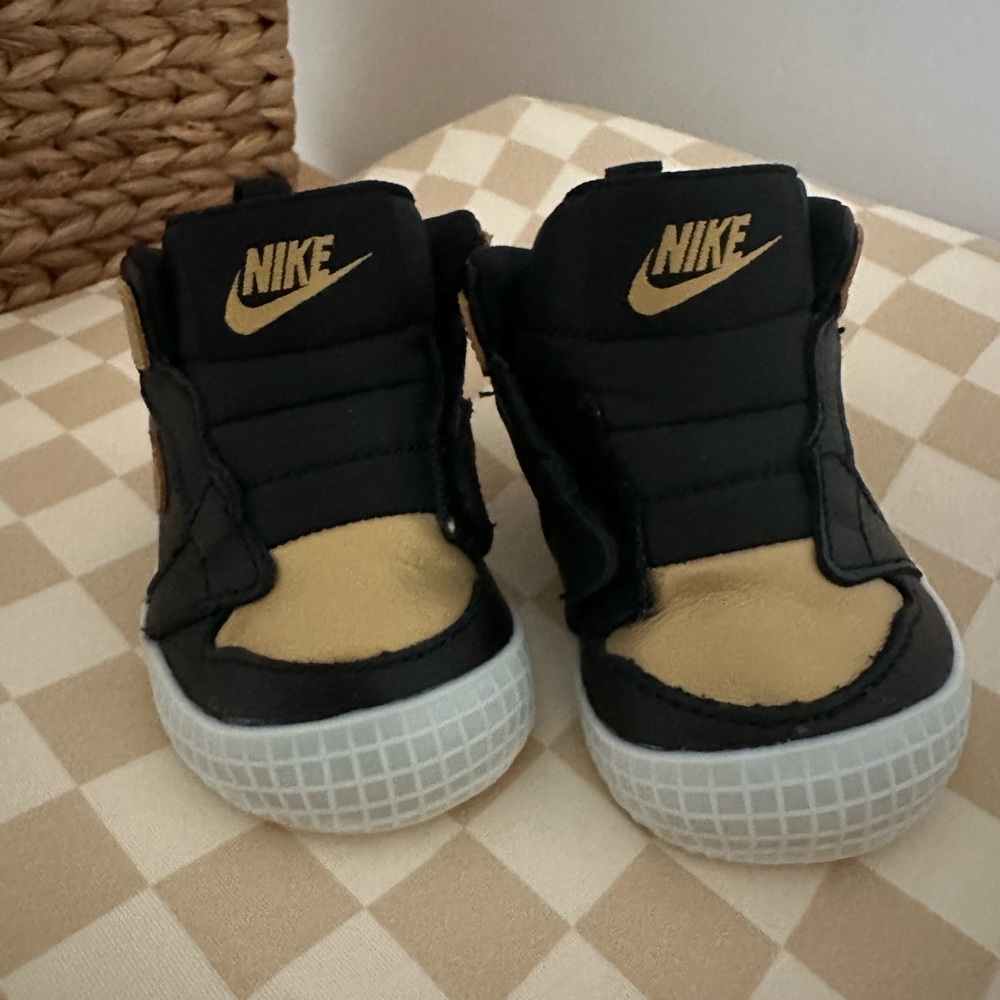 Nike Kids Black and Gold Shoes